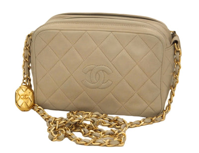 Authentic Chanel Vintage Beige Lambskin Quilted Camera Style Handbag