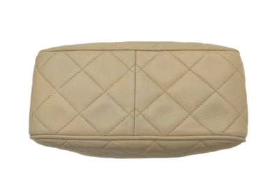 Authentic Chanel Vintage Beige Lambskin Quilted Camera Style Handbag