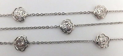 Authentic Chanel Silver Crystal Camellia Necklace
