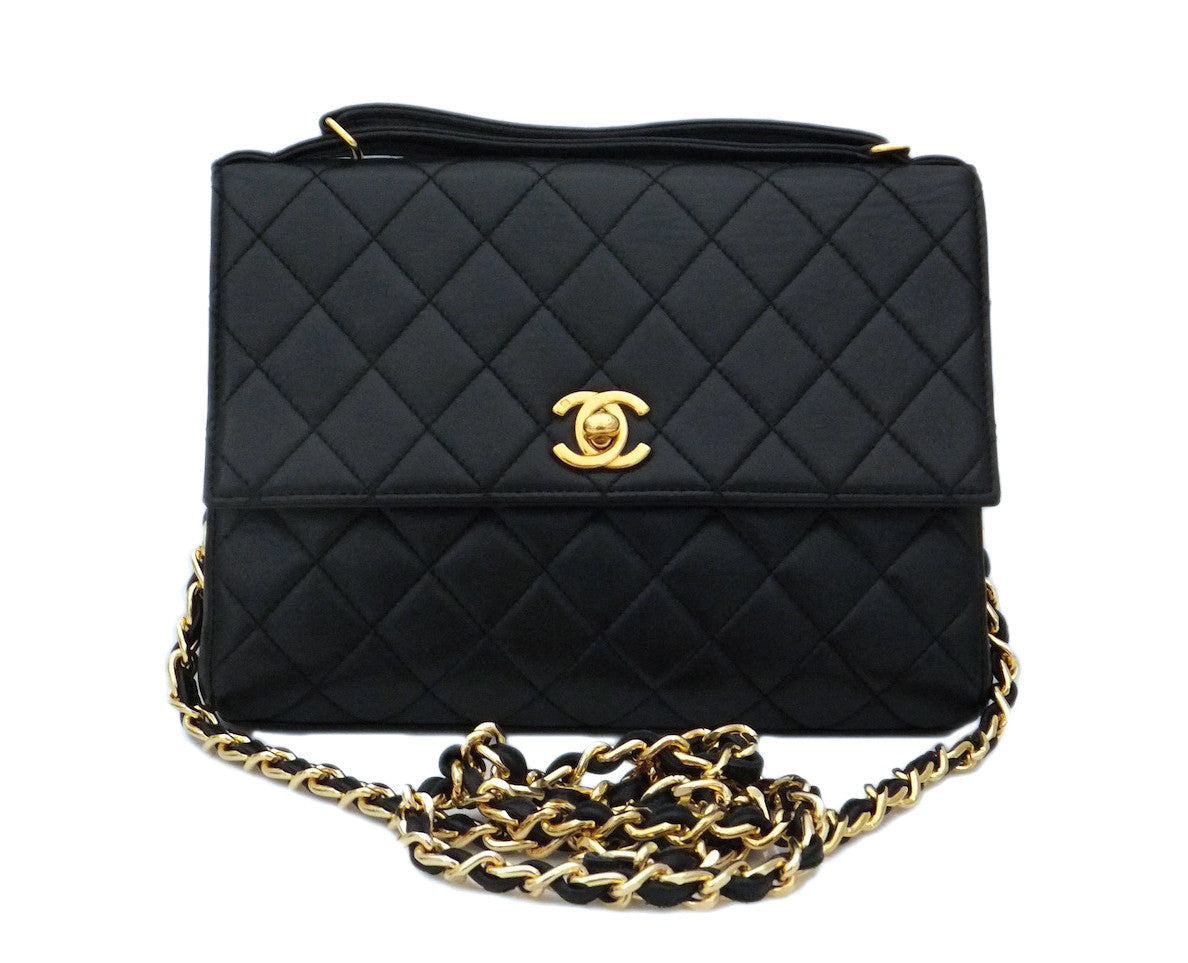 Authentic Chanel Vintage Black Quilted Flapover Handbag